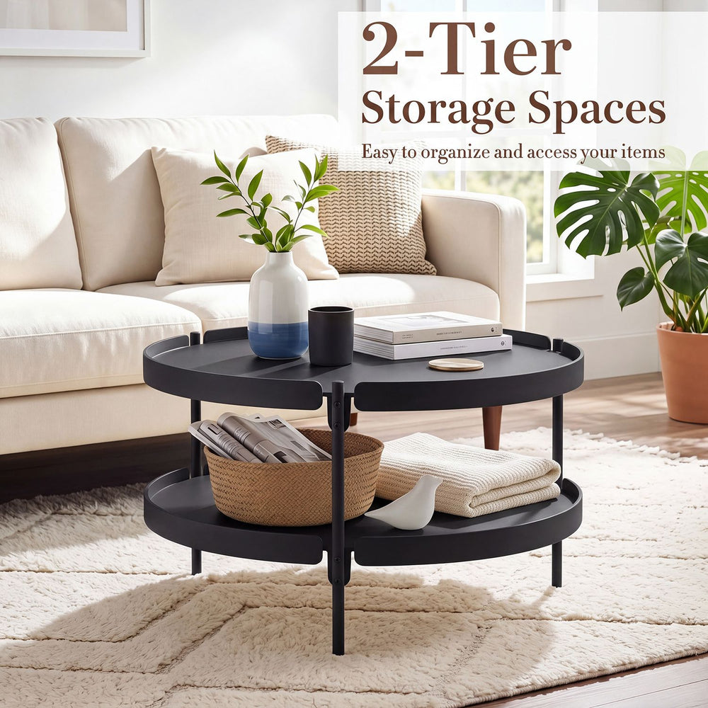 Round black 2-tier plastic coffee table with lower shelf for storage, perfect for modern living room organization.