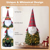 Santa-inspired 3 ft pre-lit tabletop Christmas tree features 20 warm white LED lights and a whimsical design for festive decor.