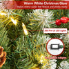 Frosted pencil fir Christmas tree with red berry clusters and warm white pre-lit LED lights in a festive scene.