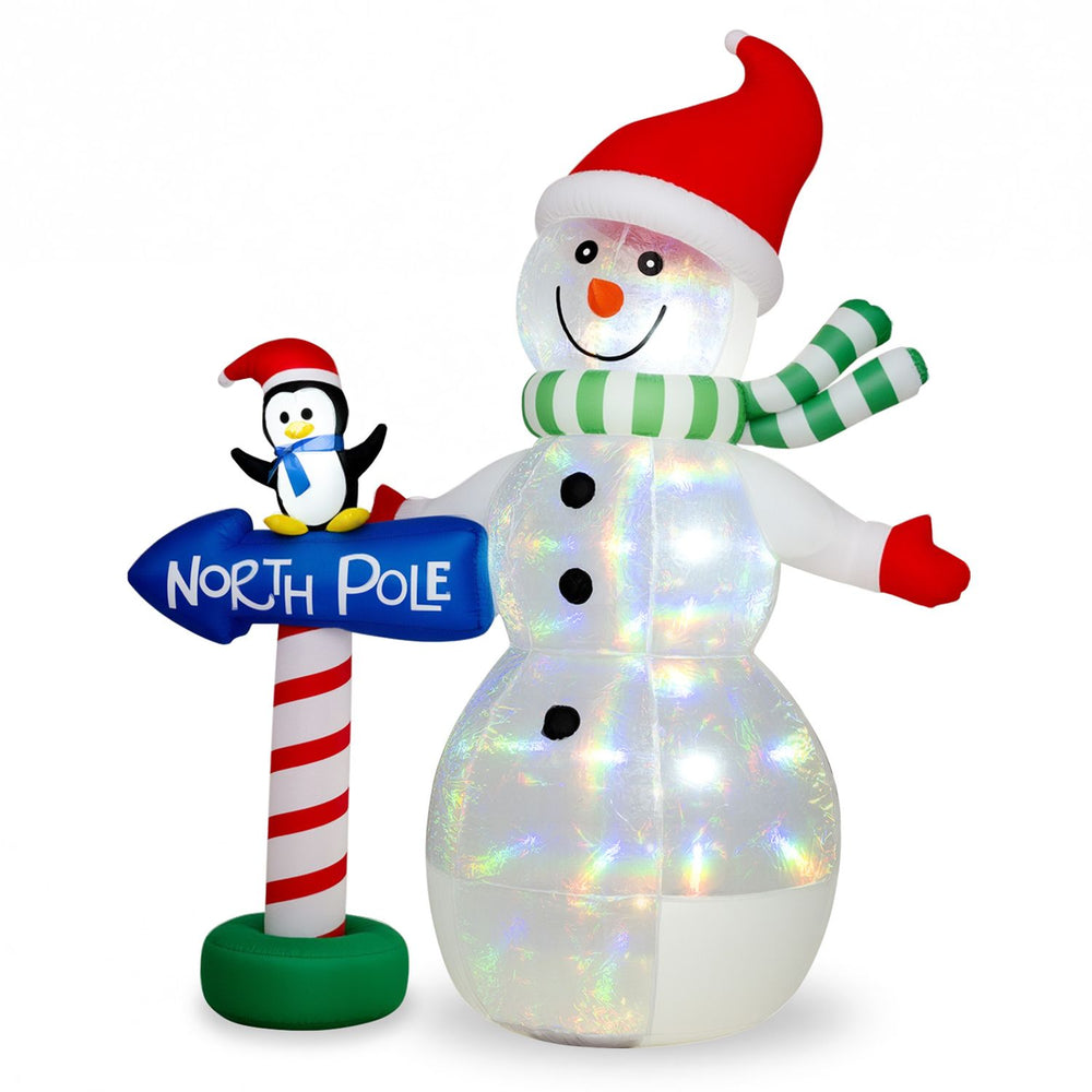 Inflatable snowman with penguin and North Pole sign, featuring colorful LED lights for outdoor holiday decorating.