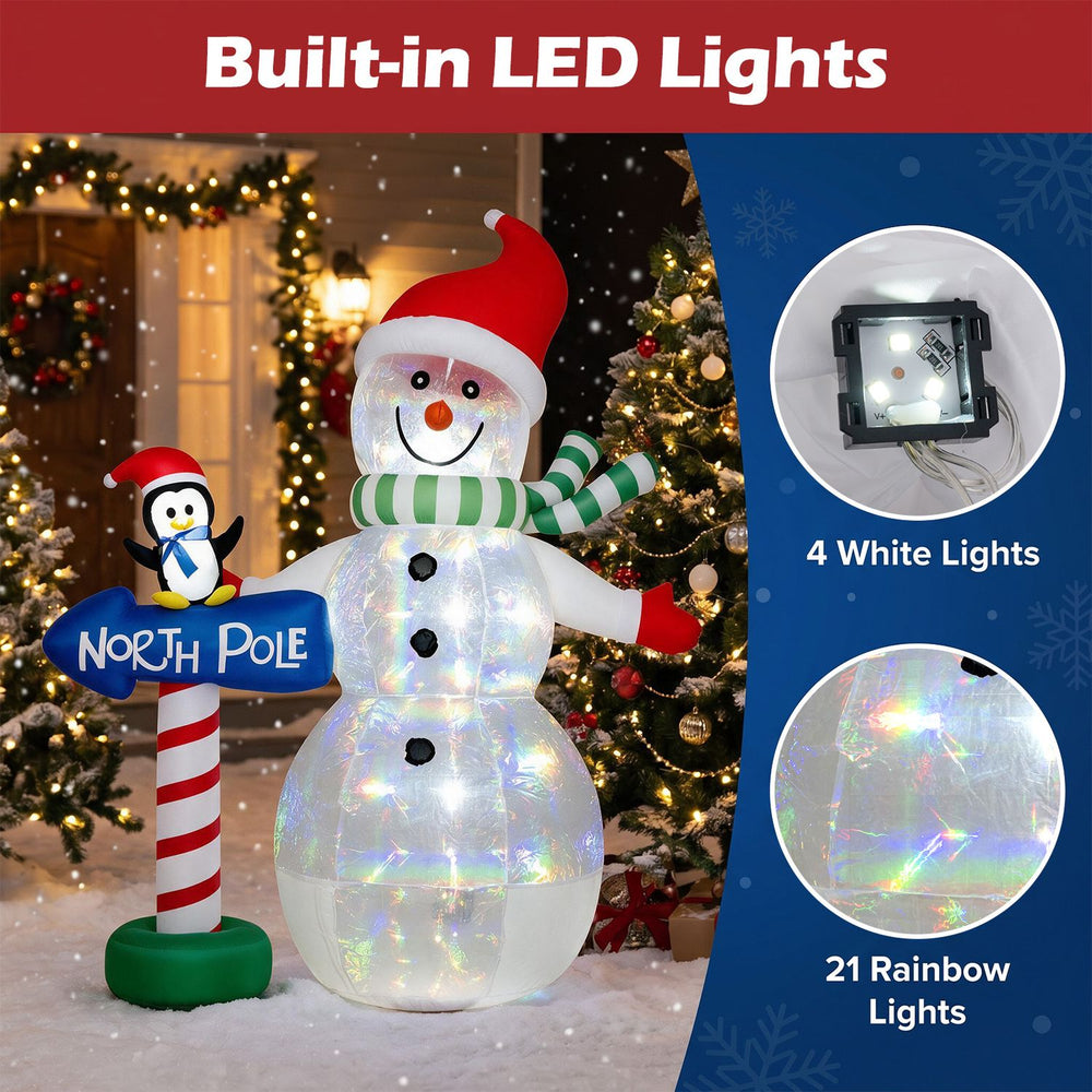 6 FT Christmas inflatable snowman with penguin and North Pole sign, featuring colorful LED lights for outdoor holiday decor.