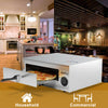 Stainless steel commercial pizza oven with a removable crumb tray, cool touch handle, and 30-minute timer for easy.