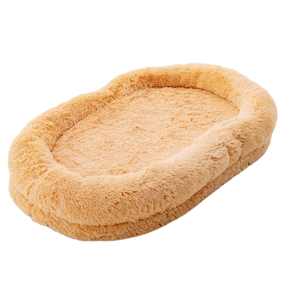Plush brown washable human dog bed with bolsters, orthopedic foam, and soft blanket for cozy pet lounging.