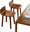Top view of two brown acacia wood dining chairs showcasing their sleek design and rustic elegance, perfect for various.