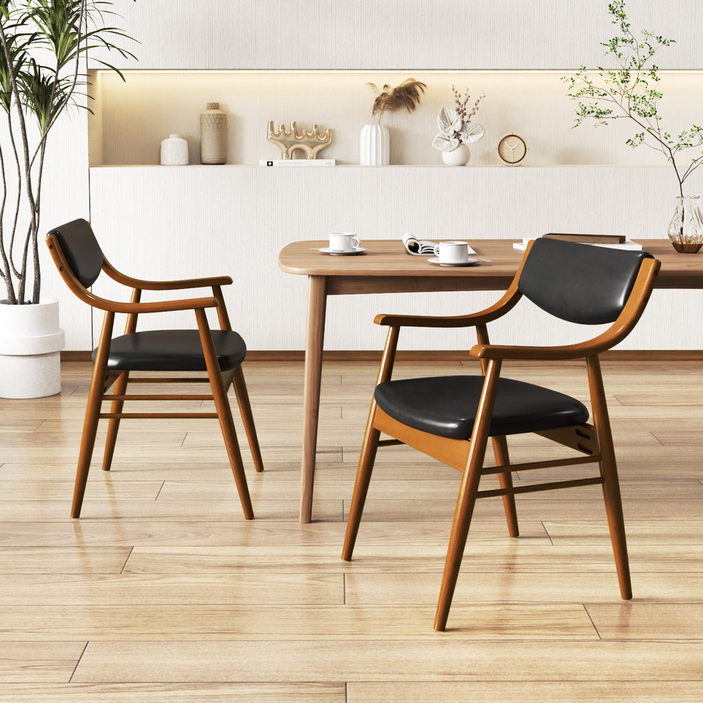 Wooden dining chair set of 2 with padded black seats and armrests, designed for comfort and versatility in any space.