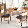 Elegant wooden dining chair showcasing a rubber wood frame and faux Sherpa backrest, ideal for enhancing dining spaces.