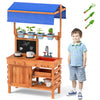 Wooden pretend play kitchen with adjustable canopy, sink, planting cups, and accessories for kids' imaginative play.