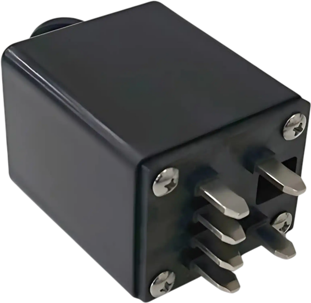 A close-up of the Journey Zoomer Power Chair Charging Adapter, a black rectangular accessory with four metal prongs and visible screws on the front.